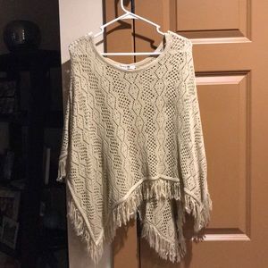 Tan poncho with fringe!